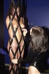 dominatrix latex suit plays