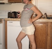 Horny-pregnant housewife strips-off tight-white shorts and stripy-panties