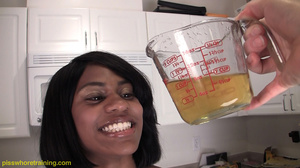 Gorgeous ebony slut pisses in jug and cums as she drinks her own piss - Picture 12