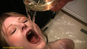 Busty babes with dark lip stick fills champagne glasses with golden piss - Picture 11