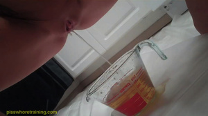 Long haired blonde gets her little pouty lips drenched in pee - Picture 9