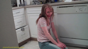 Blue eyed blonde is gaged and whipped until she pisses her tight blue jeans - Picture 1
