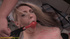 Pierced blonde is gaged, drawn on, bound and pissed on by yummy cock