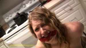 Blonde gaged and bound is humiliated until she pees in glass bowl - Picture 2