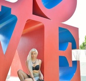 Glamorous long haired blonde strips in public park for everyone to see