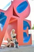 Glamorous long haired blonde strips in public park for everyone to see