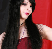 Raven haired tranny showing her giant meat pole