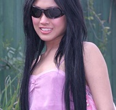 Slender brunette Asian tranny shows her big dick