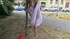 Blonde in pink shirt and white skirt shows cunt on street then sucks and