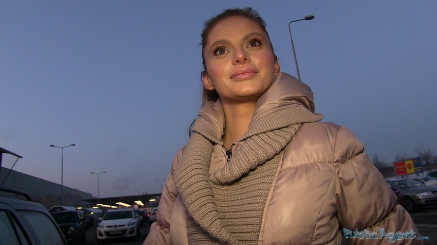 Busty brunette in brown coat shows tits and - XXX Dessert - Picture 1