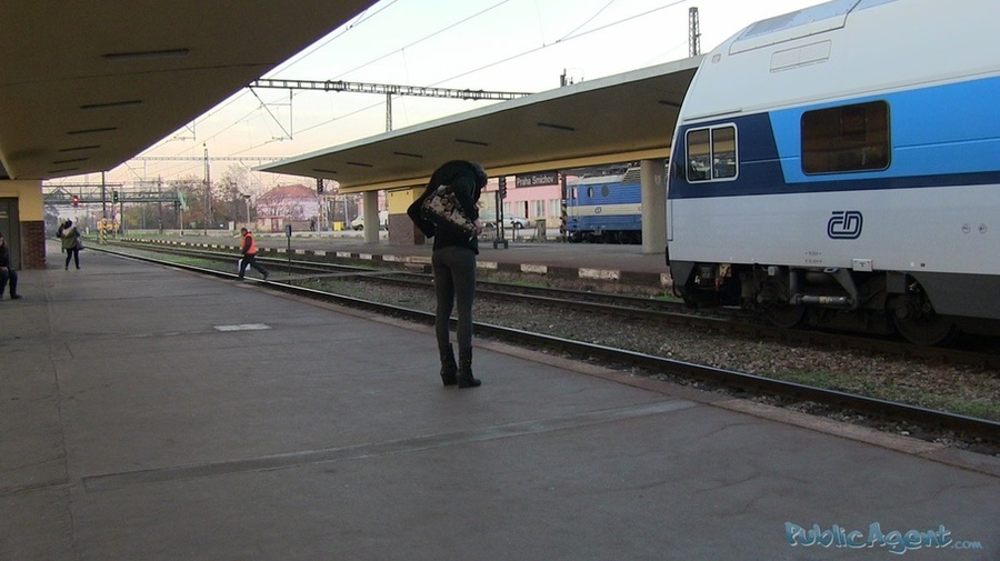 Chic brunette in grey pants and black coat  - XXX Dessert - Picture 1