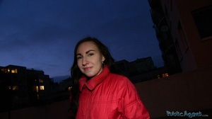 Brunette in red jacket and black top fil - Picture 1