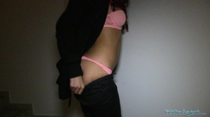Brunette in black outfit and pink linger - Picture 5