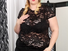 Spicy chubby blonde in black dress and lingerie rubs - Picture 1