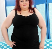 Hot chubby redhead in short black dress shows ass then sucks and screws