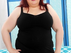 Hot chubby redhead in short black dress shows ass then - Picture 1
