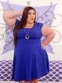 Chubby brunette in blue dress and white - Picture 1