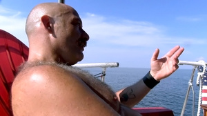 Four randy men in yacht suck and stroke  - Picture 3