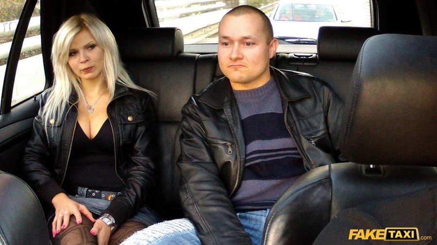 Blonde hottie rides on a fake taxi wearing her black leather jacket, shirt and jeans skirt then shows the driver her big tits before she sucks his cuck then lets him fuck her in different styles til he blasts in her mouth. - XXXonXXX - Pic 2