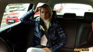 Steaming hot blonde teases with her banging body in a fake taxi wearing her black leather jacket and white shirt and pants then sucks the driver's  hard cock before she lets him bang her in different styles til he cums on her pussy. - Picture 2