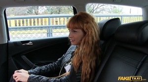 Cute redhead wearing black leather jacket lifts up her white shirt and gray bra and shows the driver her hot boobs then takes off her black pants and rubs her twat before she lets him bang her in different styles til her blows on her pussy in his fake taxi. - Picture 5