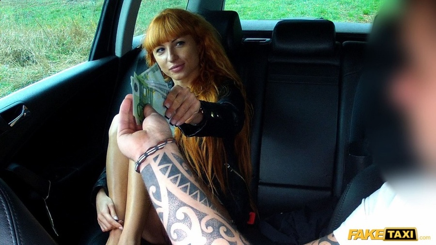 Cute redhead wearing black leather jacket lifts up her white shirt and gray bra and shows the driver her hot boobs then takes off her black pants and rubs her twat before she lets him bang her in different styles til her blows on her pussy in his fake taxi. - XXXonXXX - Pic 9