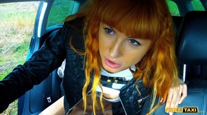 Cute redhead wearing black leather jacket lifts up her white shirt and gray bra and shows the driver her hot boobs then takes off her black pants and rubs her twat before she lets him bang her in different styles til her blows on her pussy in his fake taxi. - Picture 16