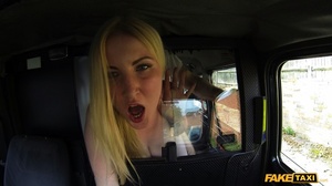 Luscious blonde peels off her black dress then teases with her smoking hot body in a fake taxi before she peels off her purple and black bra and expose her big breasts then strips down her black panty and lets the driver lick her crack then fuck her in different ways. - Picture 14