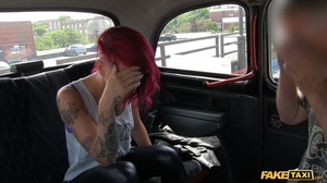 Tattooed babe with purple hair displays her foxy body in a fake taxi wearing her black leather jacket, pants and white shirt before she gets naked and sucks the driver's dick then lets him bang her in multiple styles til he fills her mouth with warm spunk. - Picture 3