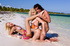 Curly hotties with blonde hair in orange and in multi colored bikini shows