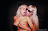 Two bad ass blondes having a threesome with a guy on a yellow bed