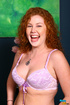 thick redhead exposes curvy