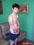 Inked rocker shows off his dick and cums over himself.