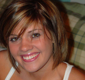 Girl in pajamas strips down in her bed.