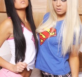 Brunette and blonde young babes strip in bed, make out afterwards.