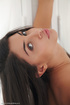 black-haired young girl lying