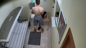 Sexy muscled twink is undressing and getting in solarium - Picture 8