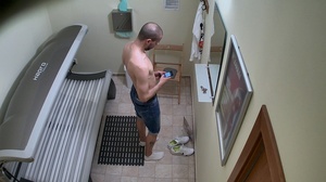 Bald young twink is taking off clothes and tanning in solarium - XXXonXXX - Pic 2