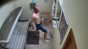 Bald young twink is taking off clothes and tanning in solarium - Picture 8