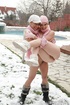 Blonde and a brunette play naked in the snow then in a jacuzzi