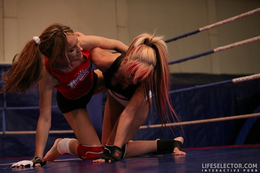 Blonde and a brunette wrestle in a boxing r - XXX Dessert - Picture 7