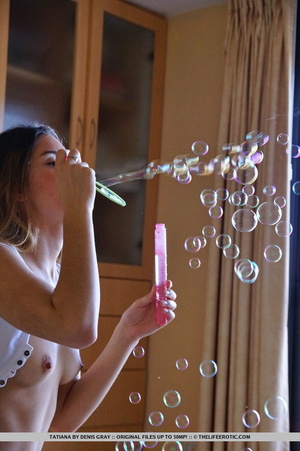 Horny blonde uses a bubble wand to pleas - Picture 4
