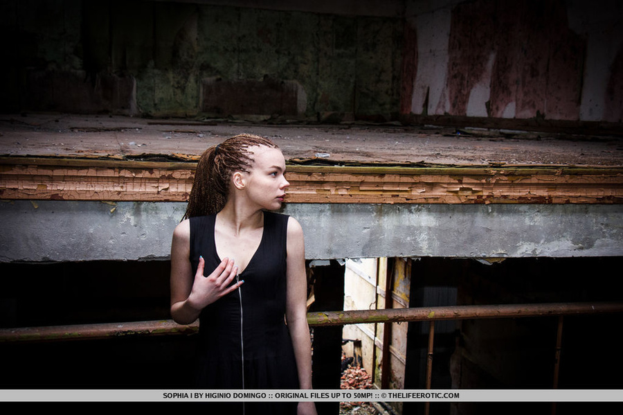 Babe with braided hair strips in a warehous - XXX Dessert - Picture 2