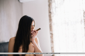 Sultry brunette smokes her cigar and spr - XXX Dessert - Picture 12
