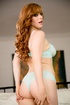 seductive redhead wearing flowery