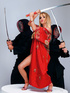 Smoking hot blonde pose her smoking hot body while holding a sword then