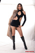 Steaming hot chick peels off her furry brown jacket then displays her
