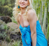 Stunning blonde girl hikes rocky mountain to get naked and expose pussy!