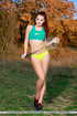 sporty redhead strips her