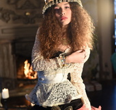 Fashion babe strips her funky clothes off to reveal naked body.